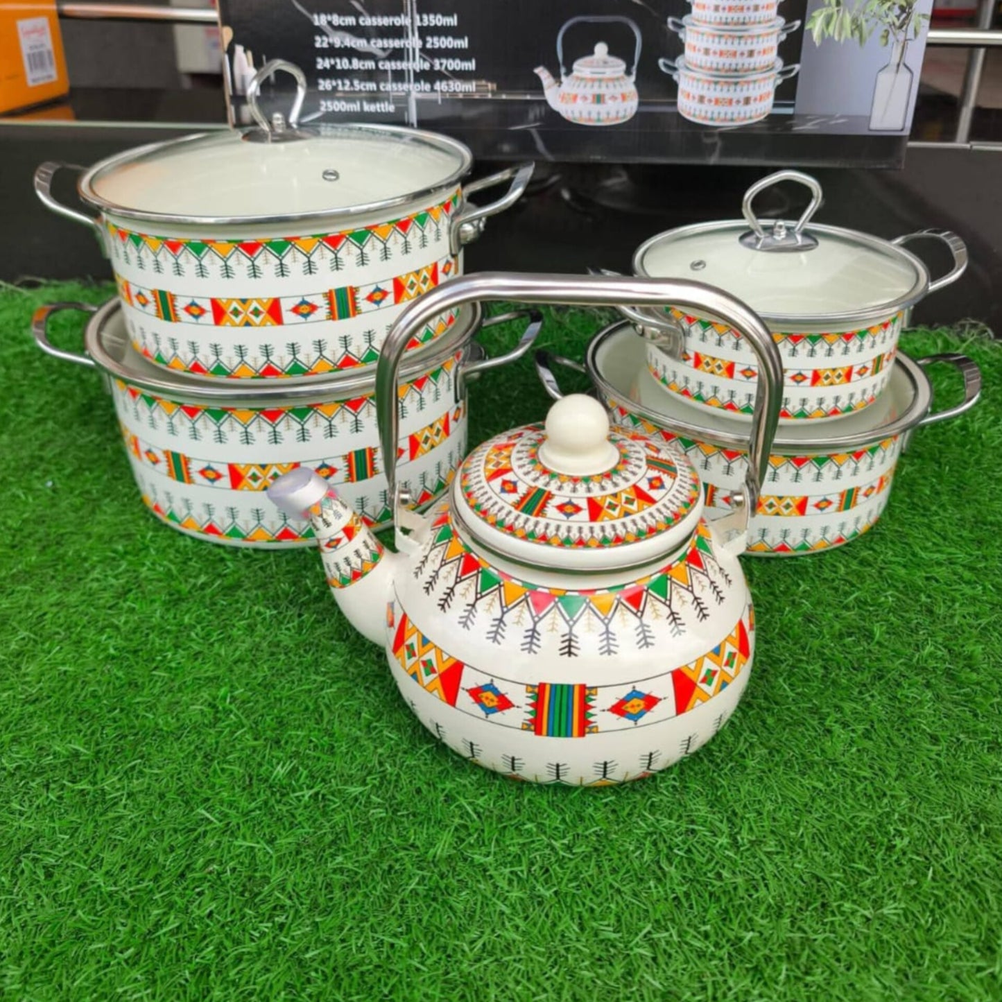 Enamel cookware set with tea pot