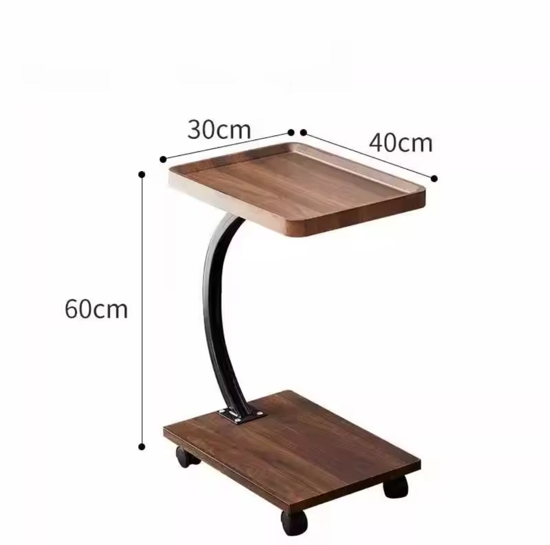 C-shaped side table with wheels
