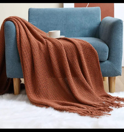 Knitted throw blanket