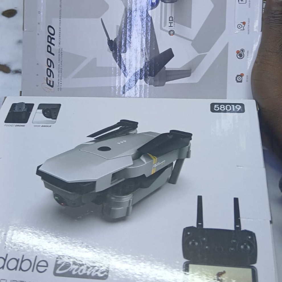 E99 drone with 3 batteries spare wings and dual camera Gha