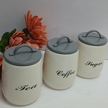 labeled Tea Coffee and Sugar canisters 