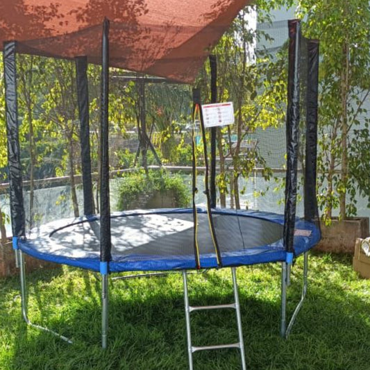 Trampoline within safety enclosure