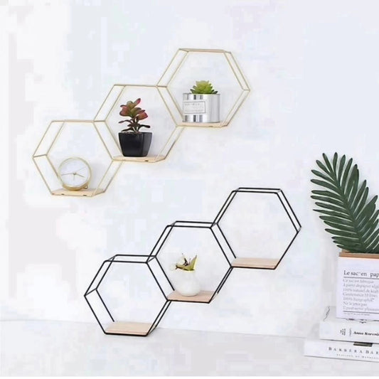Set of three interconnected hexagonal metallic floating shelves