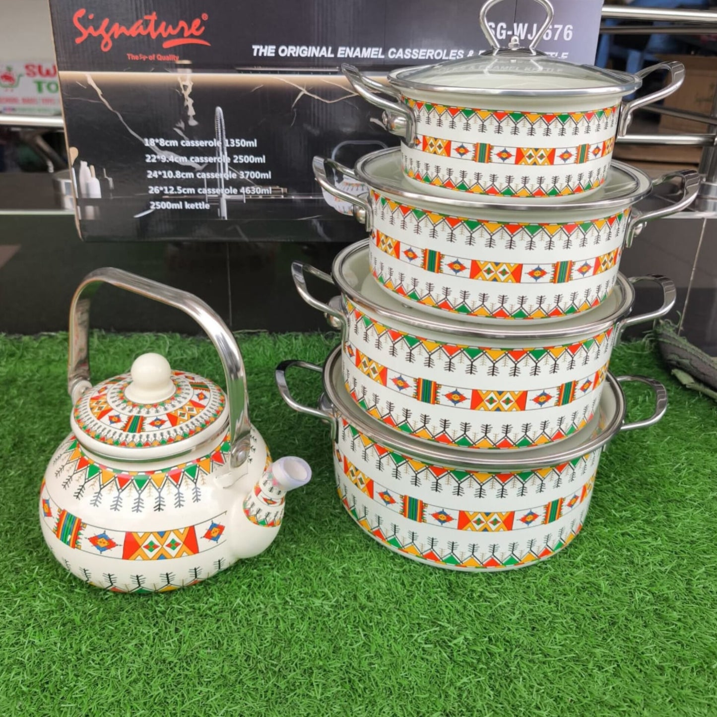 Enamel cookware set with tea pot