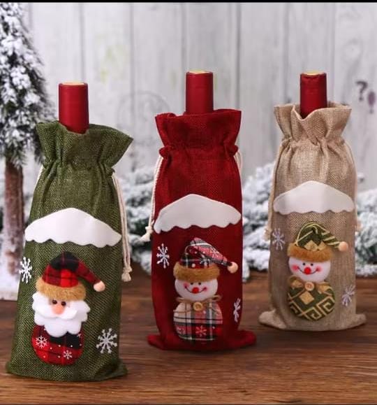 Burlap holiday bottle gift bags with Santa, reindeer, and snowman designs.
