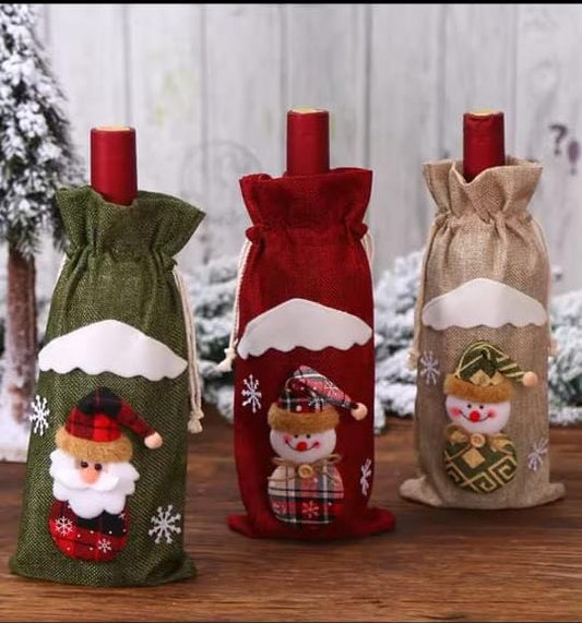 Burlap holiday bottle gift bags with Santa, reindeer, and snowman designs.
