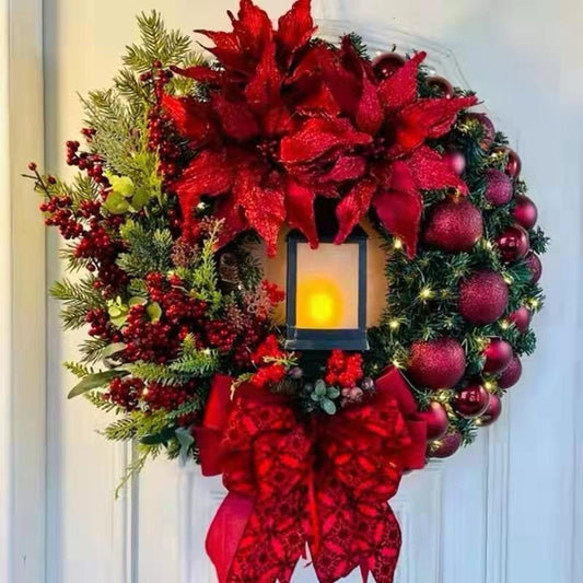 40cm Christmas wreath with red poinsettias, ornaments, berries, a red and gold bow, and a glowing central lantern.