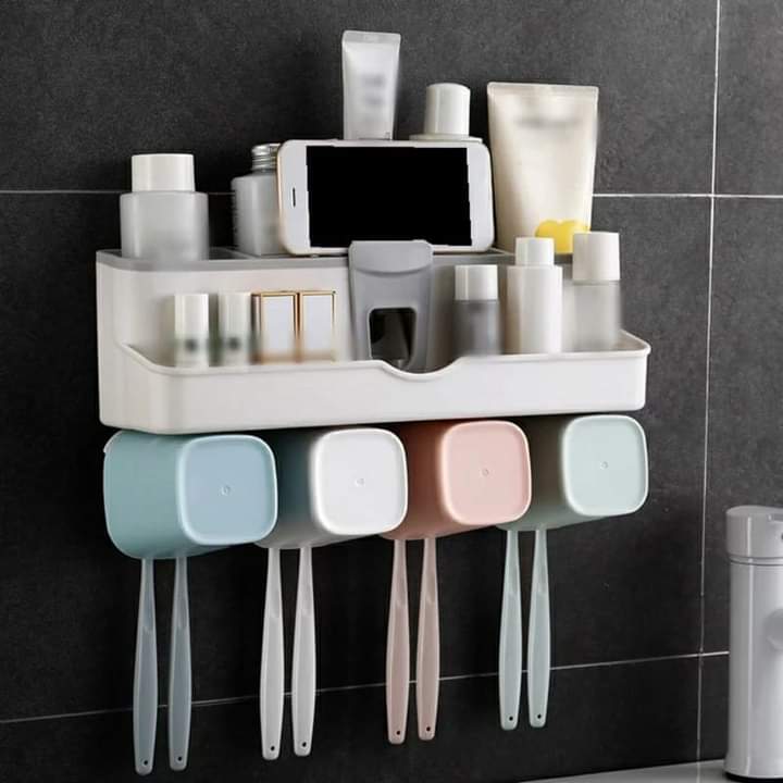 Toothpaste dispenser with 4 cups holder