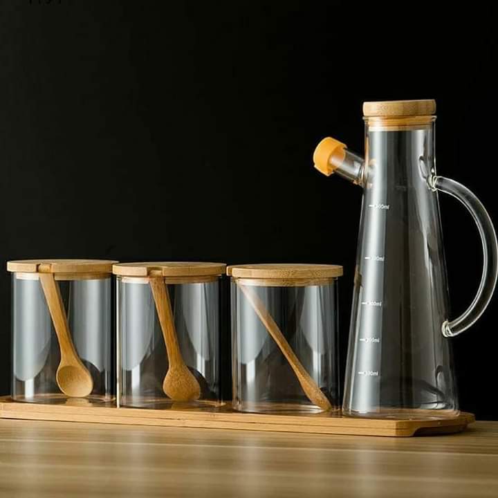 Glass cannisters +oil jar+wooden tray