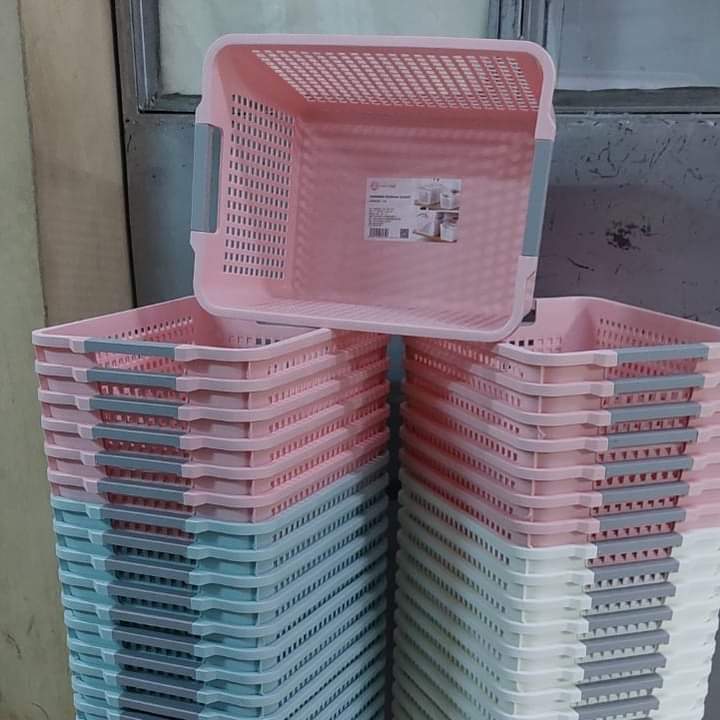 Stackable plastic storage baskets