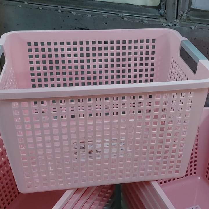 Stackable plastic storage baskets