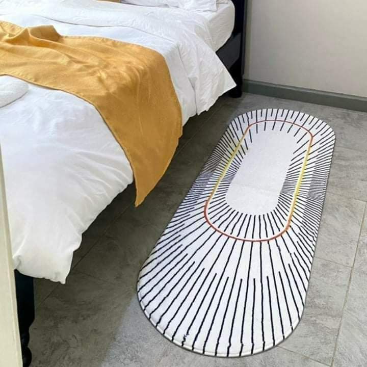 Oval shaped bedside mat