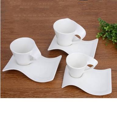 Porcelain swag cups+ saucer