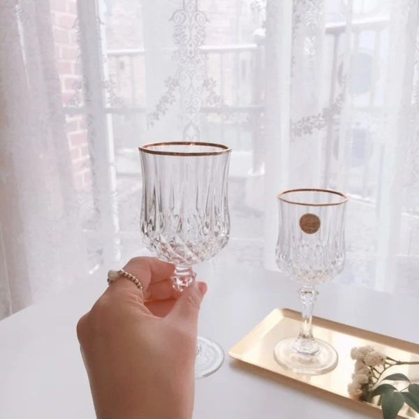 6Pc  wine glasses with gold rim